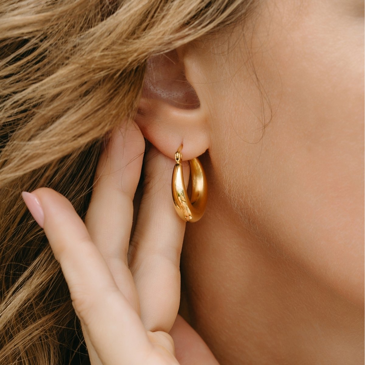NURA Ohrring Gold